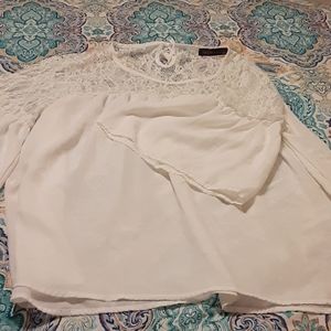 White flowing blouse